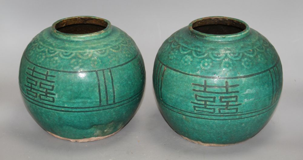 Two 19th century Chinese turquoise glazed shuangxi jars, with calligraphic motifs, height 18cm
